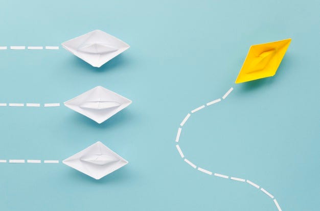 composition-individuality-concept-with-paper-boats